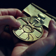 Leia examines the medal she gave Han all those years ago.
